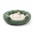 Soft plush cat bed in green and cream colors